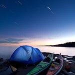 Kayak Camping Under Startrails: Kayak camping under the stars near Grand Marais, Minnesota.