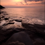 Lake Superior Puddle: A pool of water shaped like Lake Superior on the shore. Cascade River State Park, Minnesota.