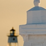 Lighthouse Snow Sculpture: During the Cook County Winter Tracks Festival, snow sculptors create temporary sculpture all over the county. Here one sculptor created a replica of the Grand Marais lighthouse out of snow. The lighthouse is in the background.