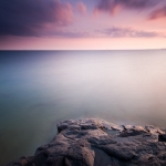 Woken From a Dream: A 72 second long exposure blurs the waves on Lake Superior and the clouds above.
