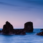 Superior Sea Stacks: Sea stacks on Lake Superior at sunrise. The Belt of Venus on the horizon.