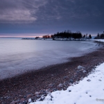 Sugarloaf Cove: Waves wash into Sugarloaf Cove on Lake Superior at sunrise.