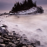 Hovland Rock I: Winter Lake Superior waves wash up the rocky beach near Hovland, MN.
