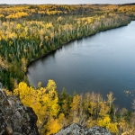 Honeymoon Bluff: Honeymoon Bluff overlooks Hungry Jack Lake. The birch in yellow fall color brighten up the boreal forest.