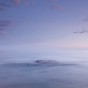 Lake Superior waves wash over a rock in this long exposure image. Artist's Point, Grand Marais, MN.