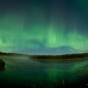 Northern lights fill the sky over Northern Lights Lake just outside of Grand Marais, MN.