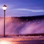 Spray and Street Light Spray rushing past a Grand Marais street light.