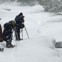 winter photography workshop participants on a frozen river
