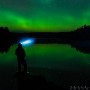 Self Portrait of me standing on a lake under the northern lights.