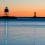 reflections of the grand marais lighthouse