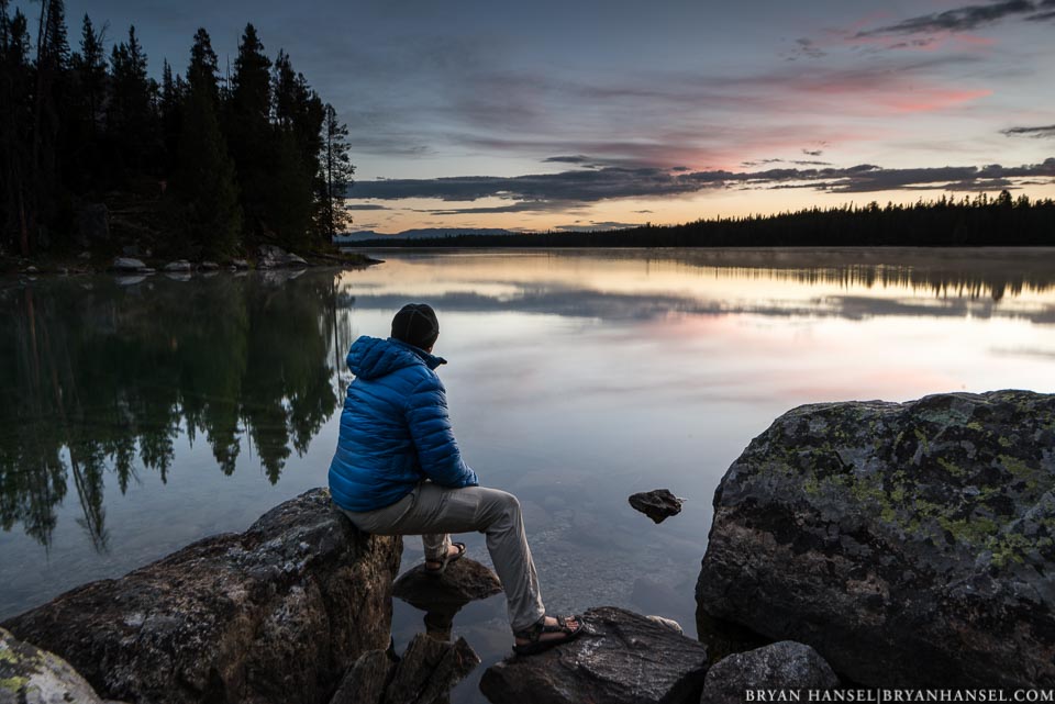 person watching sunrise in the Tetons